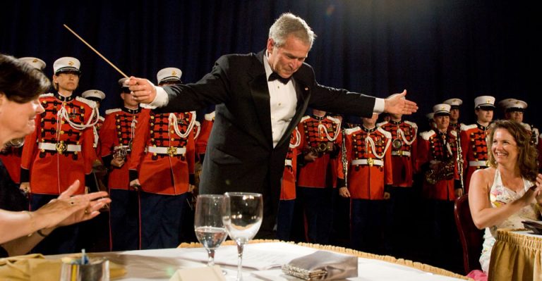 President Bush takes a bow at the 2008 White House Correspondents' Dinner. (photo/Neshan H. Naltchayan)